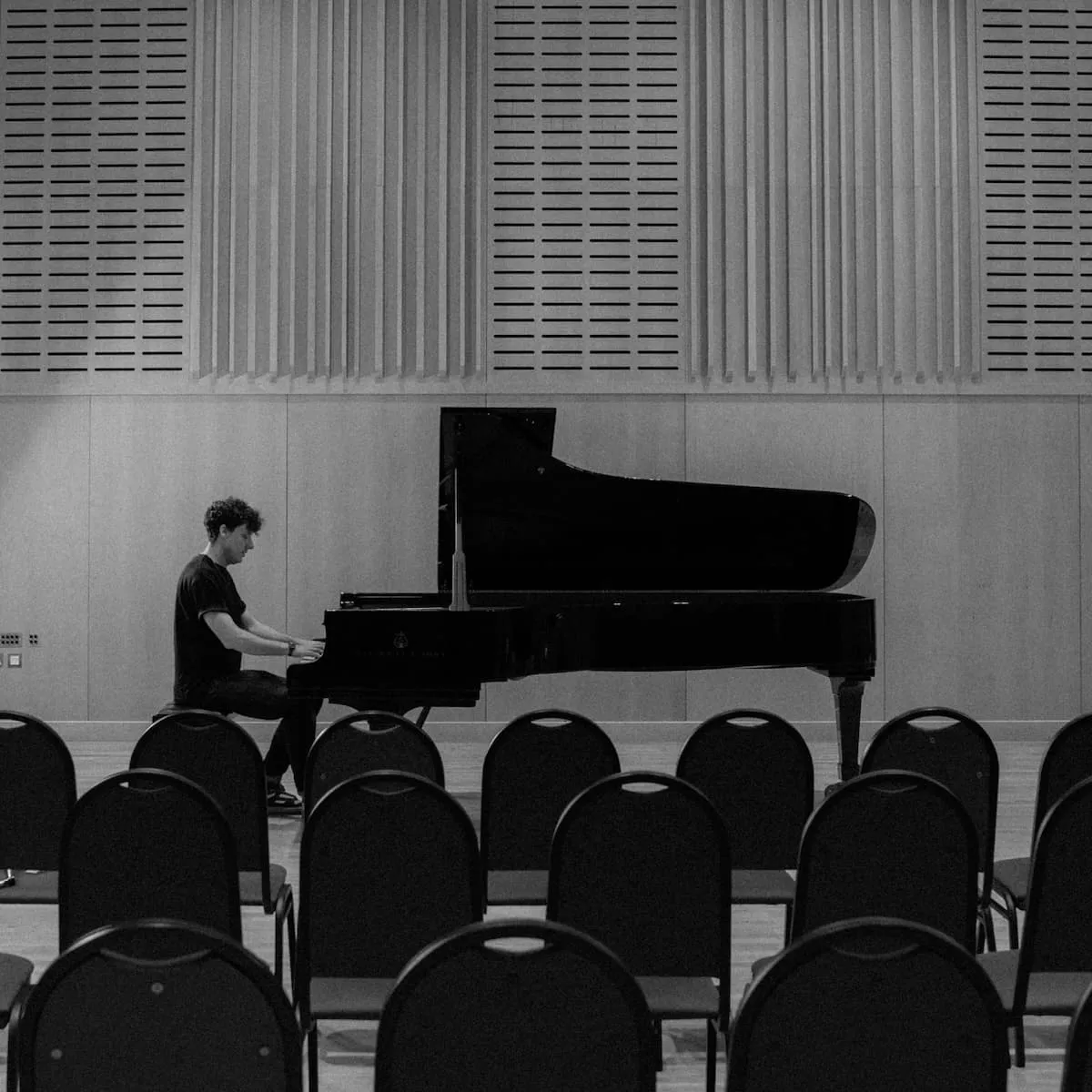 James tuning a Steinway D concert grand piano.